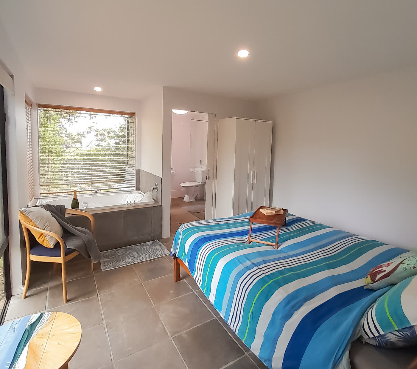 Yellow Cottage — Main bedroom, with the bath alongside and its own ensuite